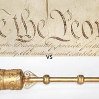 The U.S. Constitution draws its authority from the will of the people, whereas the U.K. ceremonial mace is a symbol of the crown.