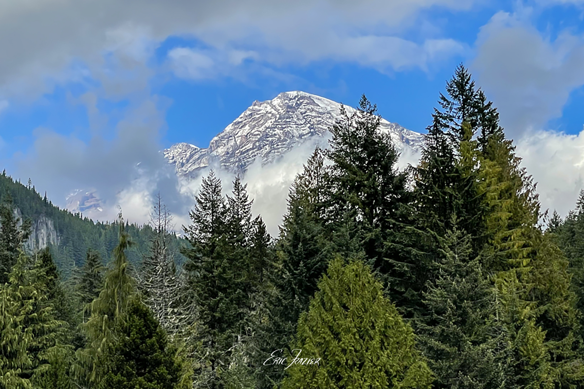 Another partial view of Mt. Rainier behind clouds from the Longmire Museum, southwest of the visitor center. Captured September 21, 2025, by Eric F. Frazier.
